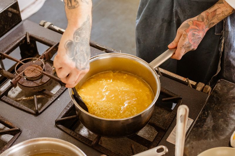 Papa Ginos kitchen — chefs preparing authentic Italian dishes with fresh ingredients