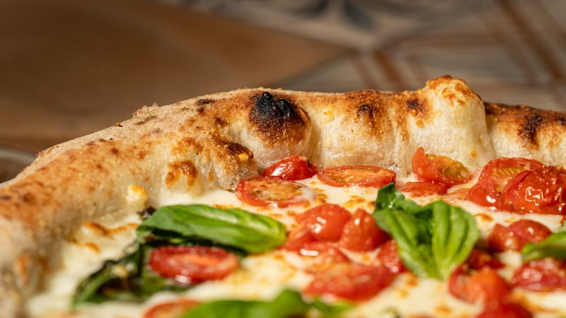 Papa Ginos Classic Margherita Pizza with fresh basil and mozzarella